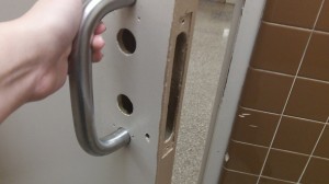 Photo by Ashley Ramer Broken doors are  one of many problems in BHS's bathrooms.