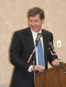 Roy Cooper, North Carolina Attorney General, gives a keynote address to Airmen during the opening ceremony of Military Saves Week at the Airman and Family Readiness Center Feb. 23.